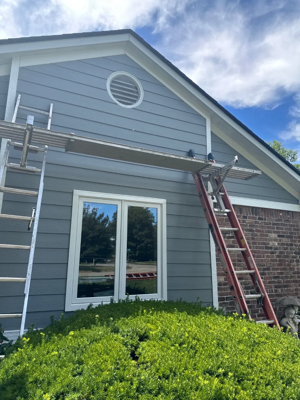 Storm-damaged siding documented in Pebble Brook